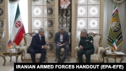 Iranian Chief of Staff of the Armed Forces General Mohammad Bagheri (right) meets with Russian Security Council Secretary Sergei Shoigu (left), in Tehran in August.