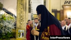 Georgian Patriarch Ilia II leading a midnight Christmas service at the Holy Trinity Cathedral in Tbilisi on January 7.