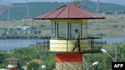 A guard walks on a watchtower at a Georgian prison (file photo)