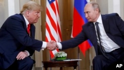 US President Donald Trump and Russian President Vladimir Putin shake hands in Helsinki, Finland, in 2018.