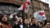 Students protest the decision on March 13 outside the Education Ministry in Tbilisi.