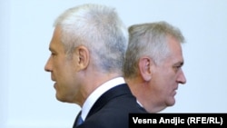 Serbian President Tomislav Nikolic (right) and his predecessor Boris Tadic at the inauguration ceremony in Belgrade in June.