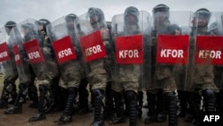 Turkish soldiers serving in KFOR, the NATO-led peacekeeping force, take part in a crowd and riot control exercise near the town of Ferizaj, in southeastern Kosovo. (file photo)