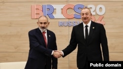 Armenian Prime Minister Nikol Pashinian's meeting with Ilham Aliyev, the president of Azerbaijan. (file photo)